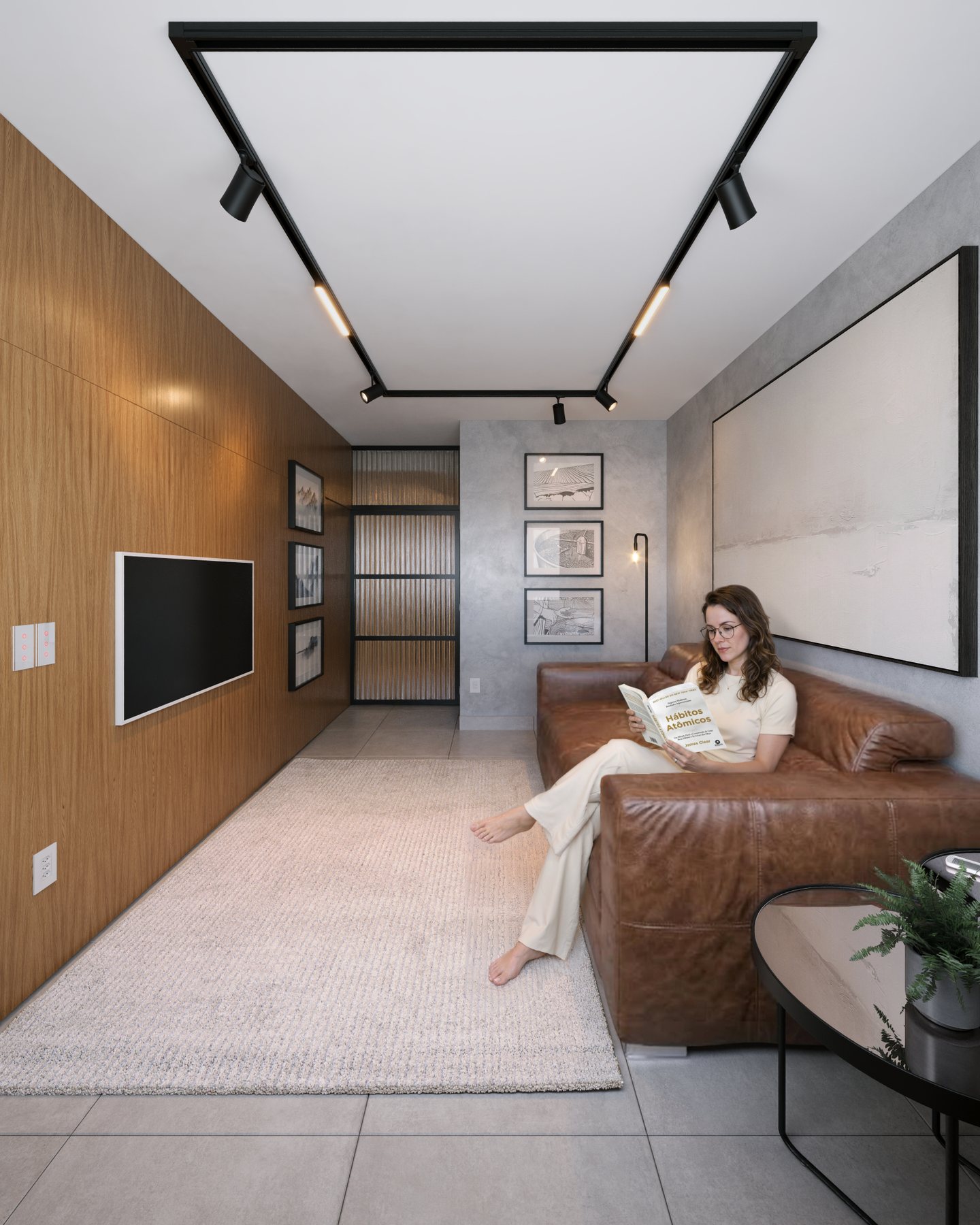 Sala de TV de residencia em Cuiaba, com painel de madeira ripada, parede em cimento queimado, trilho de iluminacao preto no teto, sofa de couro caramelo e tapete claro